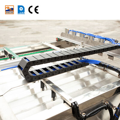 Automatic Cone Sleeving Device For Production Lines Operation In Food Processing Industries